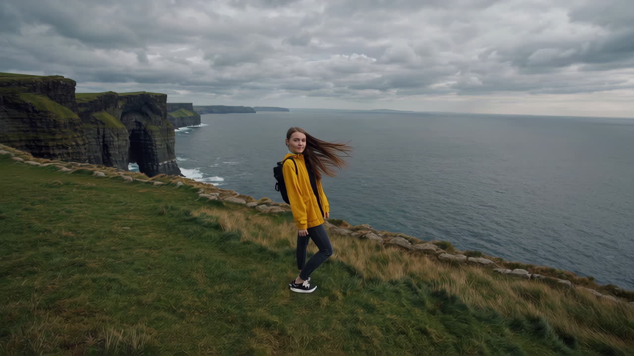 A person enjoying the majestic Cliffs of Moher in Ireland