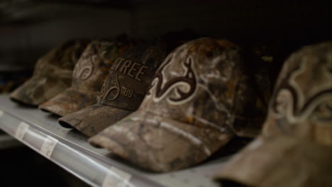 camo hats for sale in a store