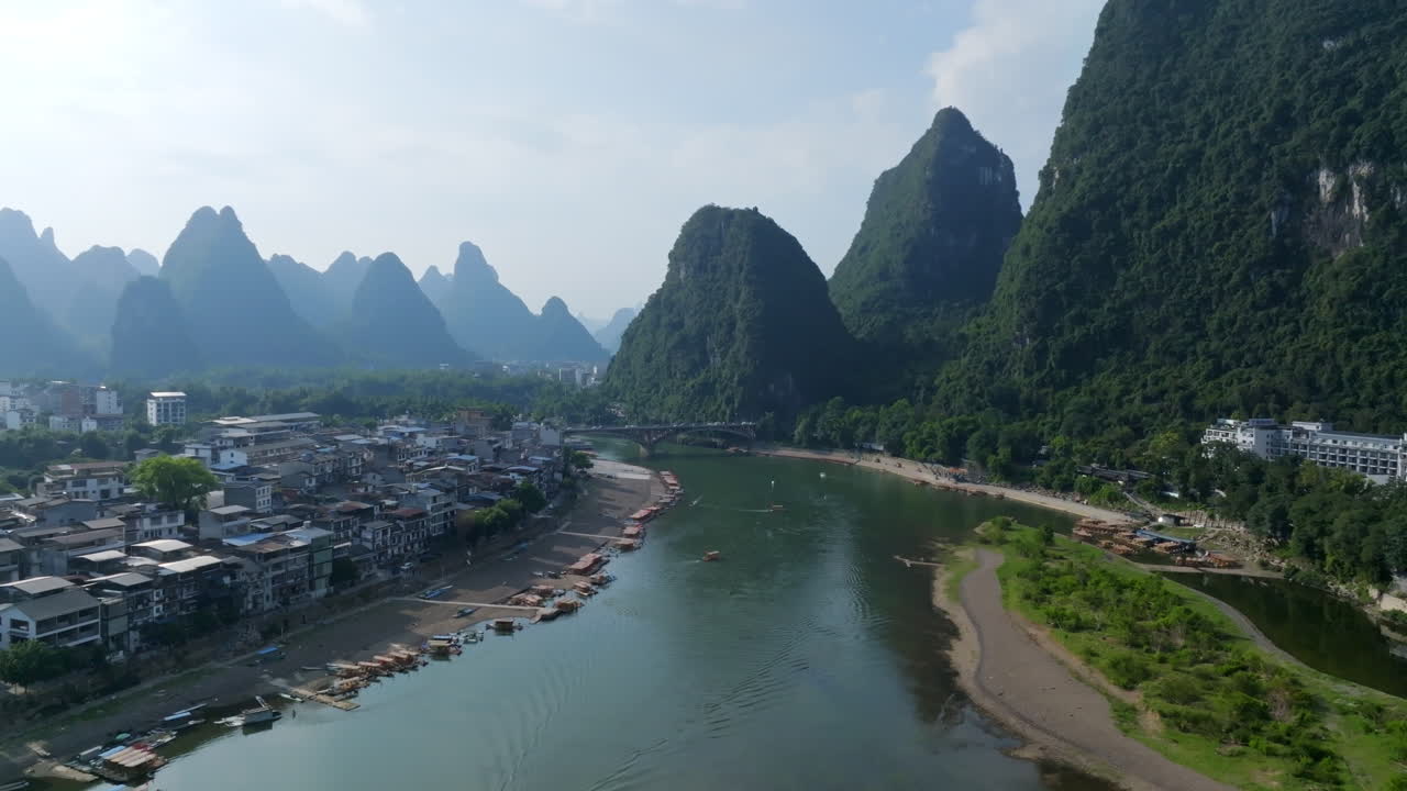 Aerial view approaching the Yangshuo bridge, summer day in Guangxi, China