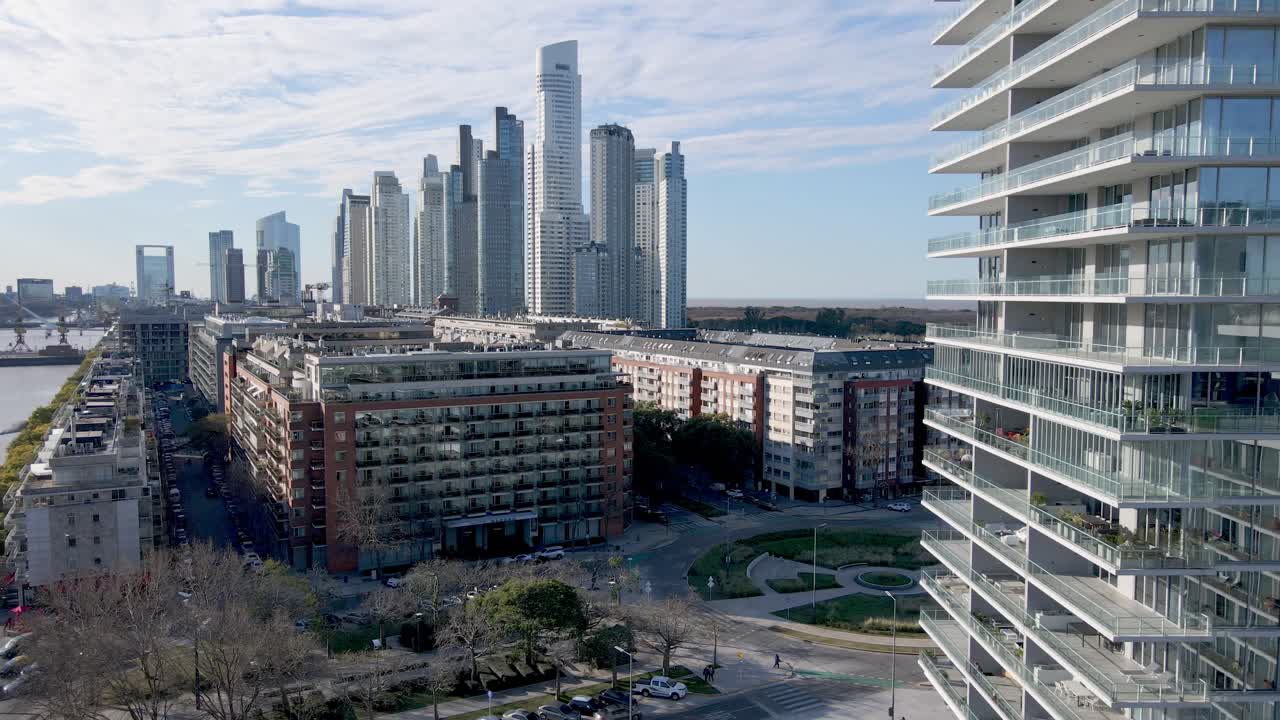 4K Aerial Drone Footage of Modern Puerto Madero with Apartments and Offices Alone Waterfront in Buenos Aires, Argentina.