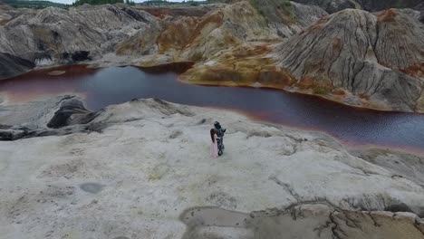 couple in a quarry landscape