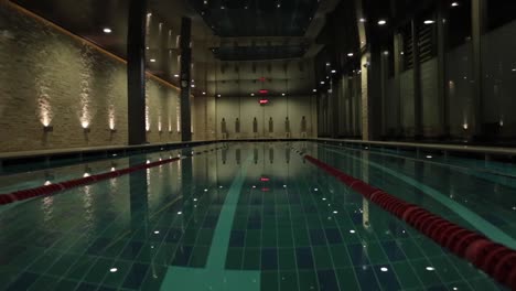 empty indoor swimming pool at night