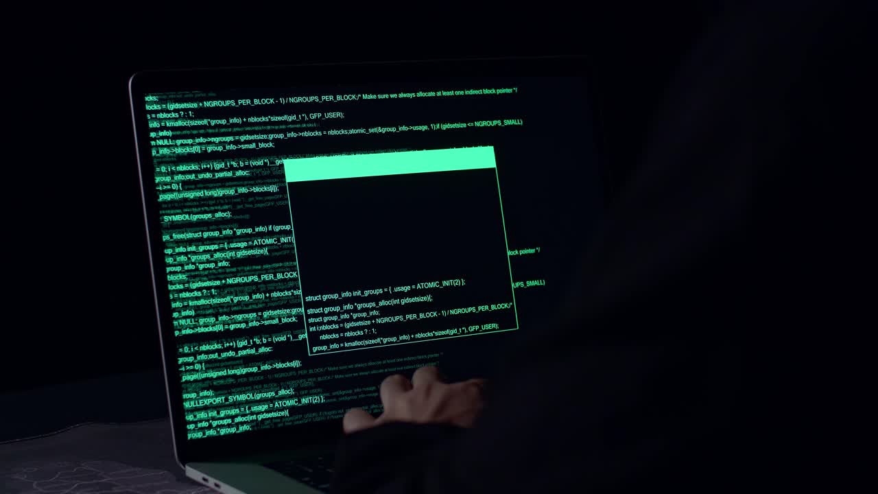 Hands Hacker Using Laptop Computer Hacking In The Dark Room