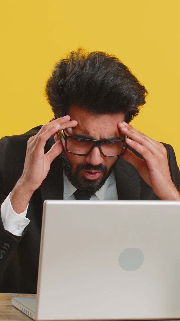 Business man working on laptop loses becoming surprised sudden lottery results bad news fortune loss