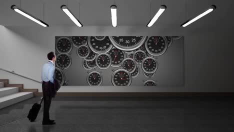 businessman staring at a hallway screen