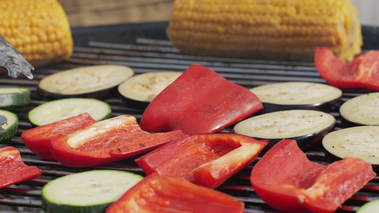 Vegan vegetarian bbq barbuque, grill Many various of green vegetables on plate close-up. Fresh artichoke, green pepper, zucchini, avocado. Cafe and restaurant food.