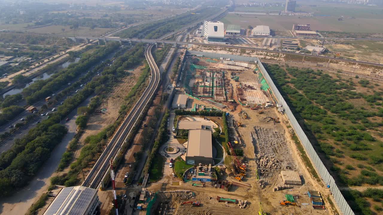 Aerial drone shot capturing a massive construction site in Noida India