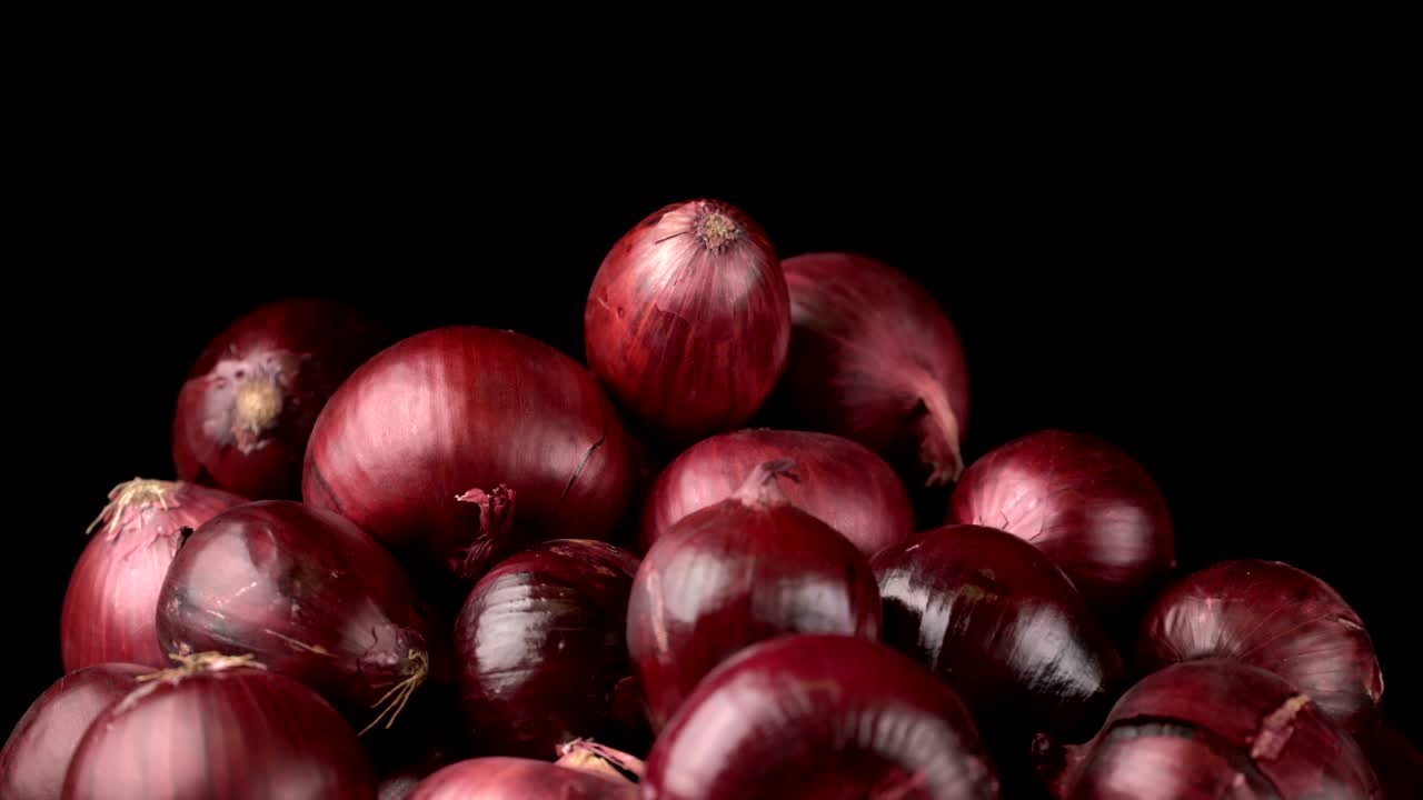 fondo de cebollas rojas giratorias