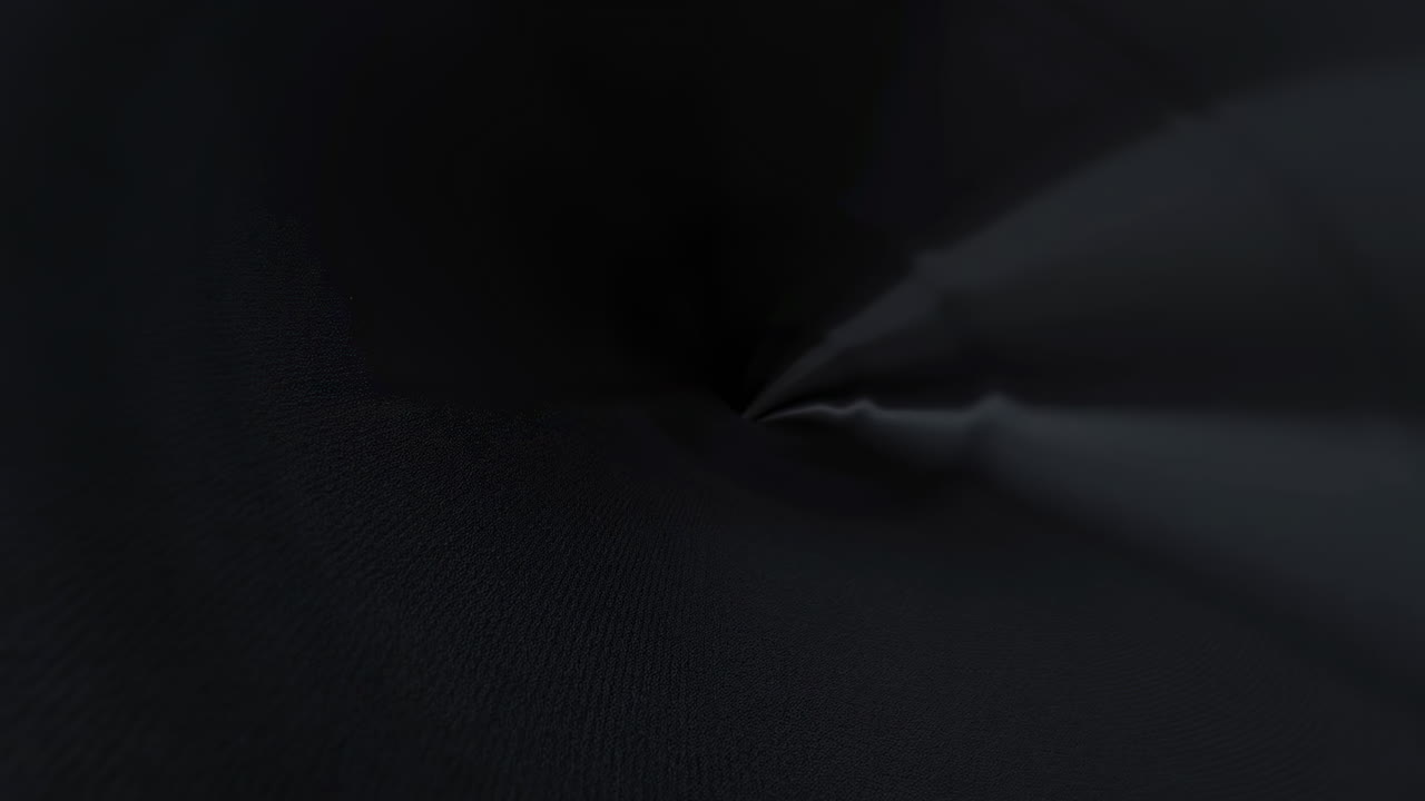Dark Textured Fabric Forming CentRAM Depression, Closeup Of Soft Folds With Subtle Sheen, Tactile Surface