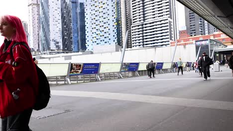 people walking on a busy melbourne street