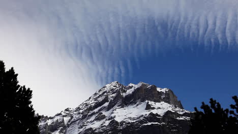 cirrocumulus cloud dreamy ripples at swiss peak alps