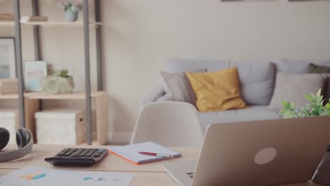empty employee desk workplace with computer and documents on it