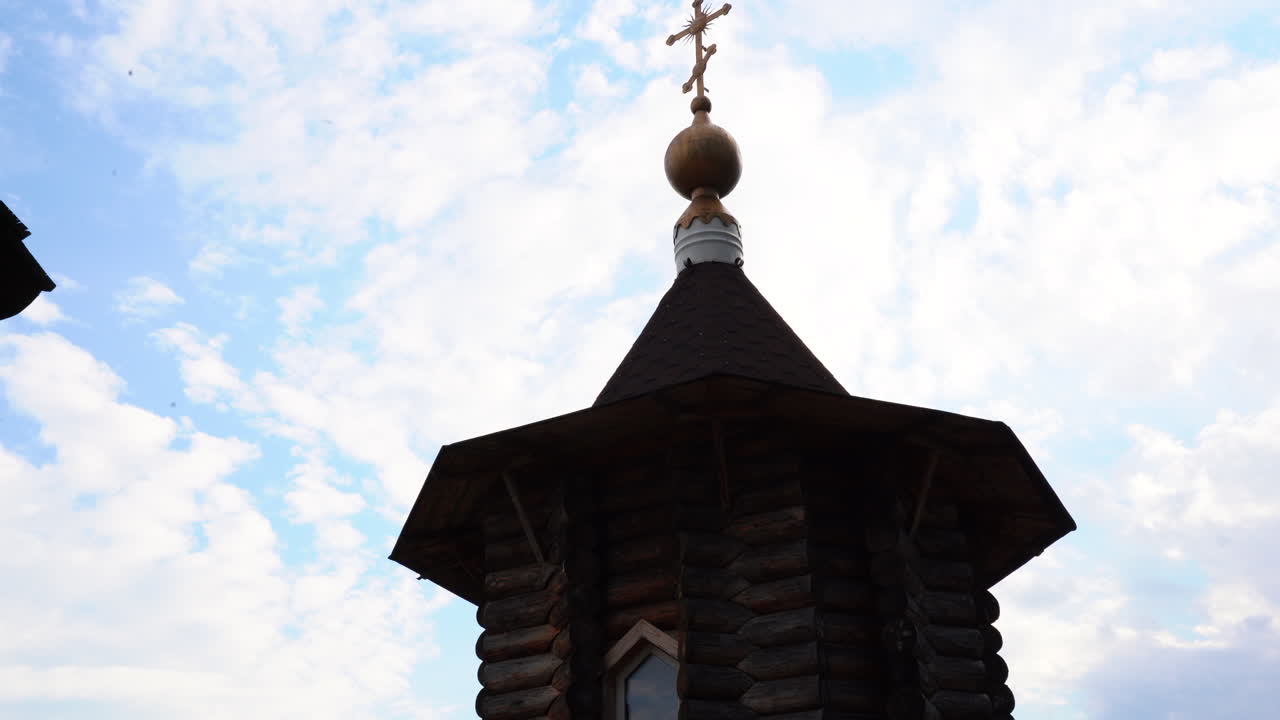 Wooden Church Tower with Cross and Dome