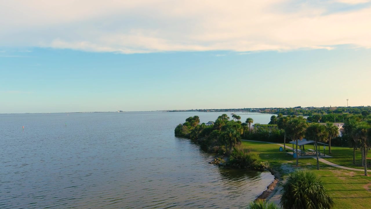 Scenic view of Kelly Park East in Merritt Island, Brevard County, Florida, along the Banana River. The peaceful waterfront park features natural Florida shoreline, open water, boating access, and a re