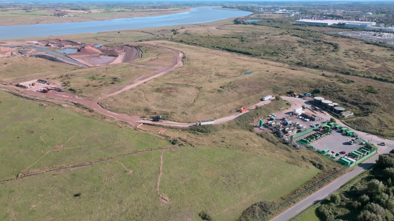Landfill Next To River With Road Connected To Recycling Site. Jameson Road Landfill And Recycling Site, Fleetwood, UK