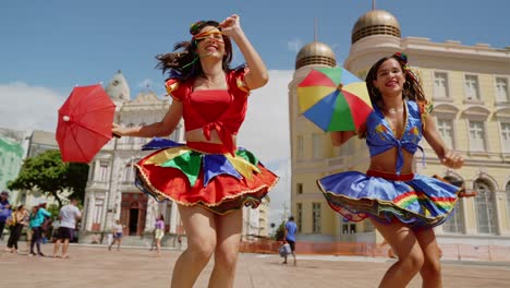 frevo dancers at the street carnival in recife, pernambuco, brazil.