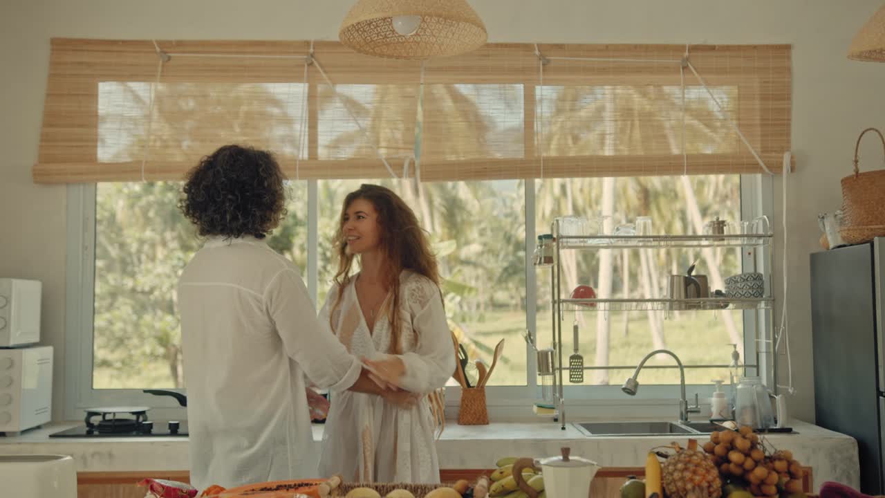 Couple in a Tropical Kitchen