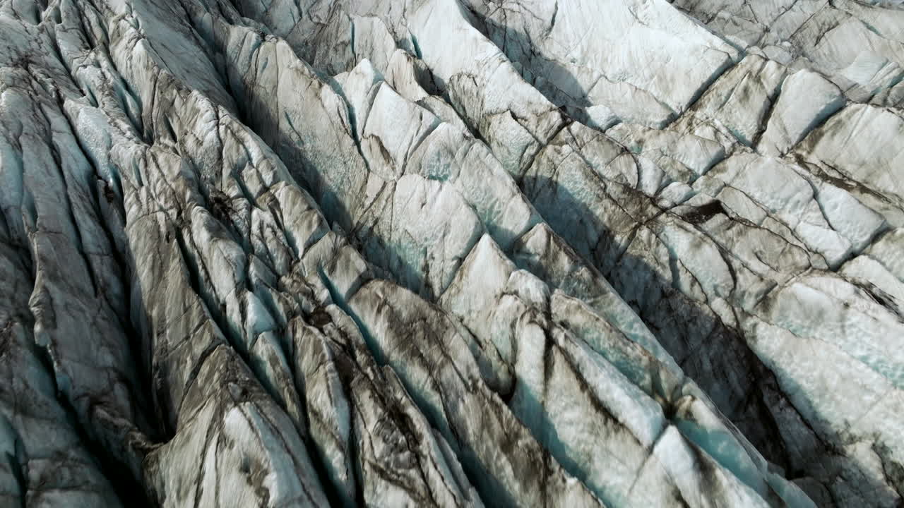 Glacier Ice Pattern Of Sv&iacute;nafellsj&ouml;kull Glacier In Iceland - Drone Shot