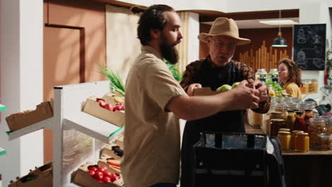 deliveryman picks up farm grown fruits