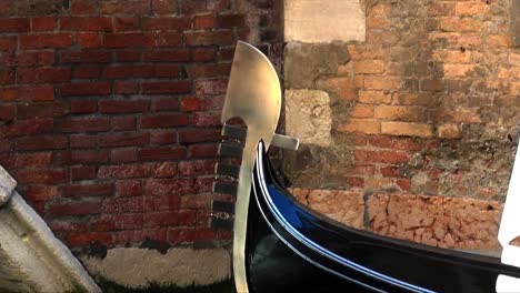 Close-up-of-the-bow-iron-prow-or-fero-da-prora-of-a-Venetian-gondola