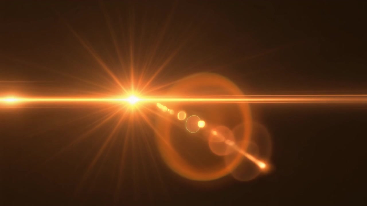 Effetto bagliore lente dorato che si muove su uno sfondo scuro