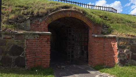 an ancient gate of bricks at tunnel in russia