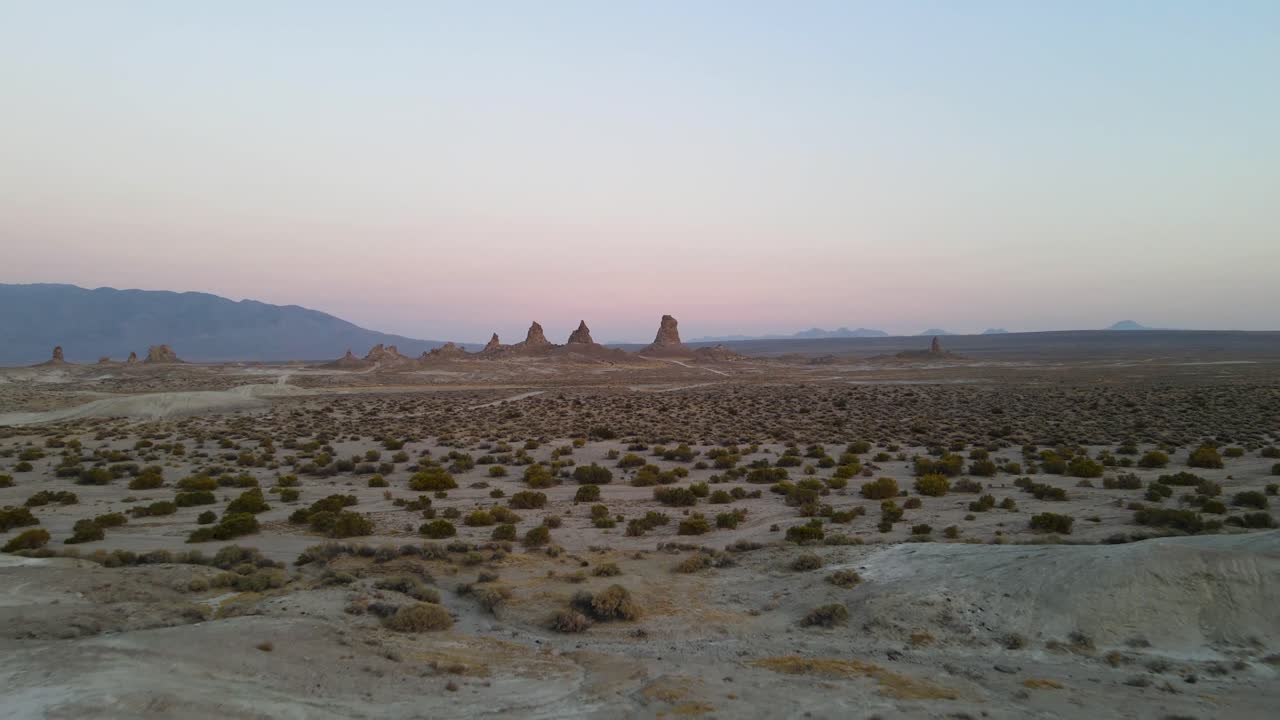 The Trona Pinnacles are an unusual geological feature in the California Desert National Conservation Area. An area where you can camp with these unusual spires surrounding you in the desert. 24 fps.