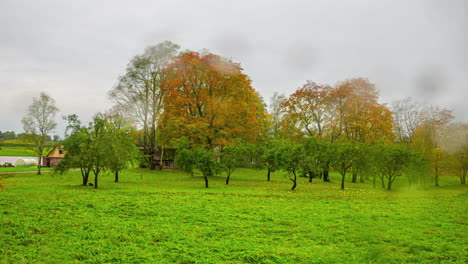 Sky-and-seasons-from-autumn-to-winter-at-a-countryside-farmhouse---time-lapse