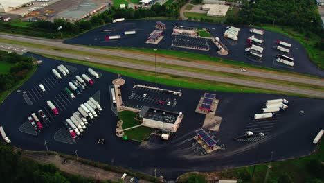 orbiting aerial of service plaza in elkhart indiana usa