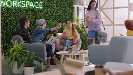 diverse group of business people meeting happy students talking enjoying conversation friends sharing connection together in relaxed trendy office