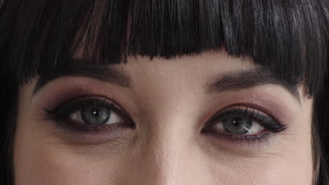 close-up-caucasian-woman-eyes-wearing-makeup-looking-happy-at-camera-blinking-beauty-cosmetics