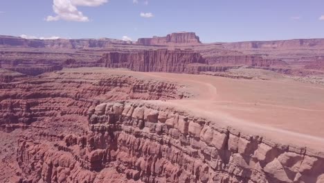 Flying-Towards-Red-Desert-Mountain-Cliff,-Aerial