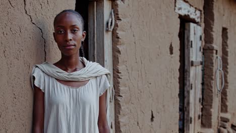 young woman in rural african village