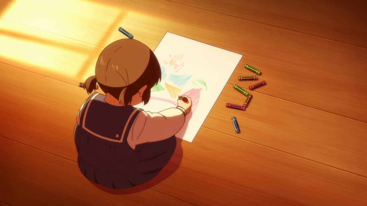 Young Child Drawing with Crayons on a Wooden Floor in Warm Sunlight