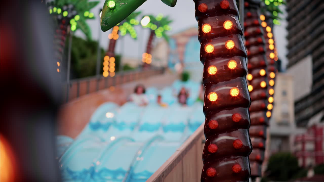 Blurry view of people at the attractions park in Nice, France