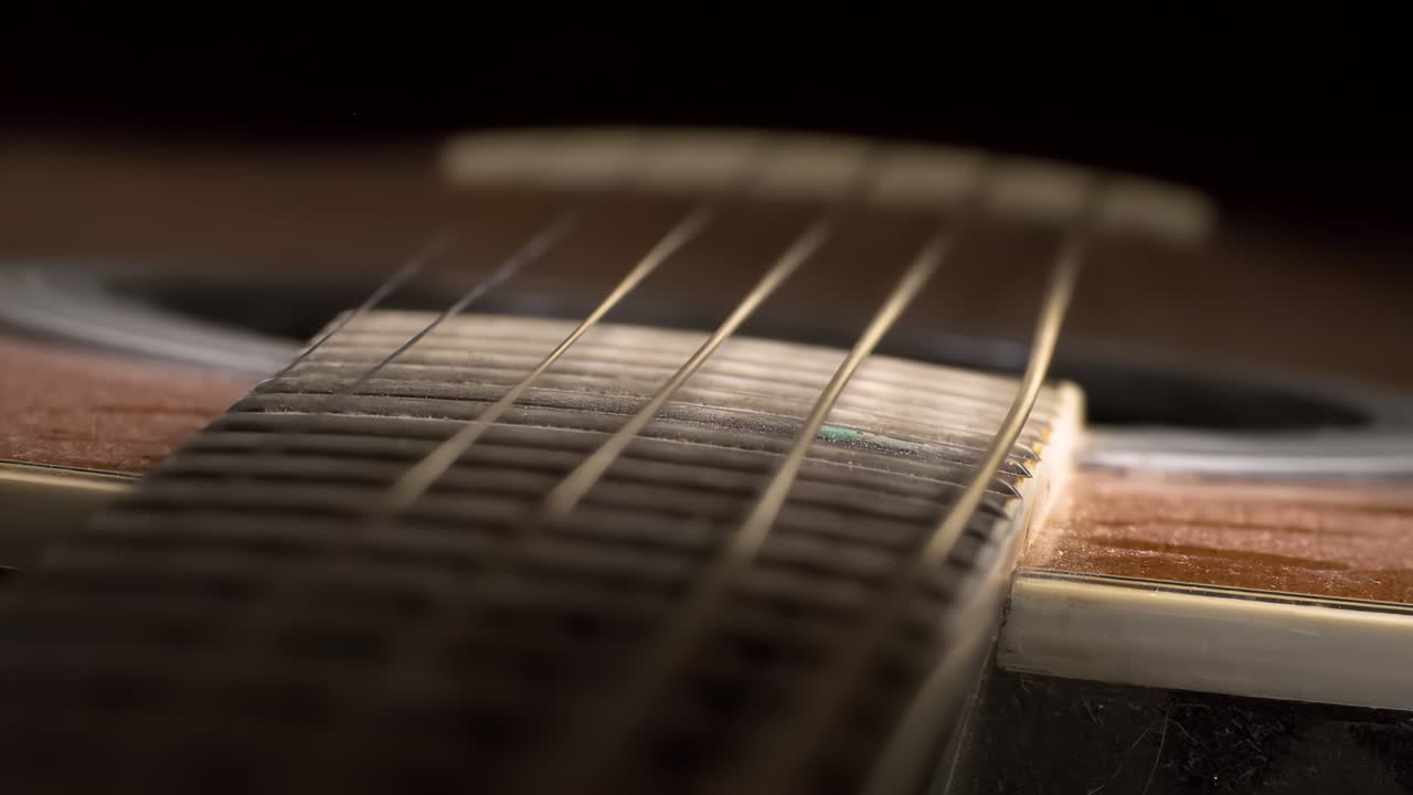Acoustic guitar strings vibrating, Shot on super slow motion camera 1500 fps