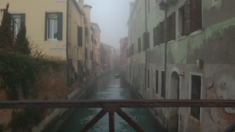 misty canal serenity in venice, italy