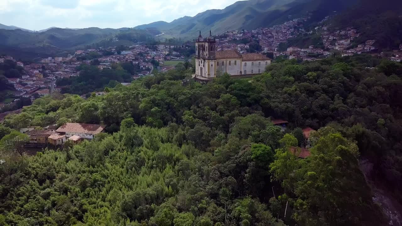 Aerial shot of Ouro Preto, Minas Gerais, Brazil, showing green hills and architecture