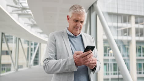 Phone,-walking-and-senior-business-man-in-office