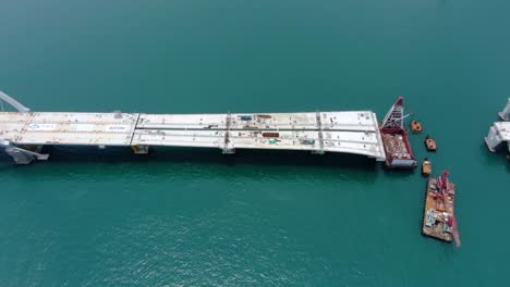 proyecto de construcción del enlace cruzado de la bahía de hong kong, un puente doble de dos carriles que conecta el túnel tseung kwan o lam tin con la carretera wan po, vista aérea