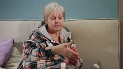elderly woman checking her watch
