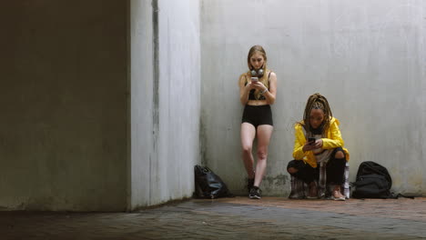 street dancer women team on phone social media