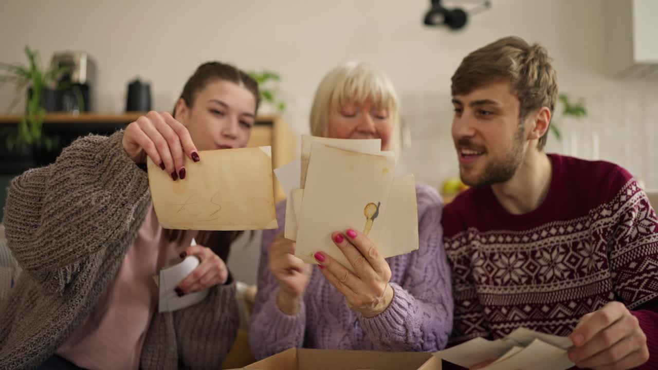 Family Looking Through Old Photos