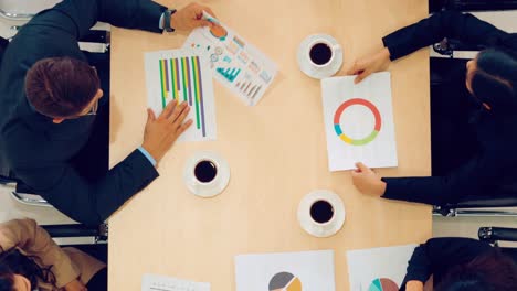 Business-people-group-meeting-shot-from-top-view