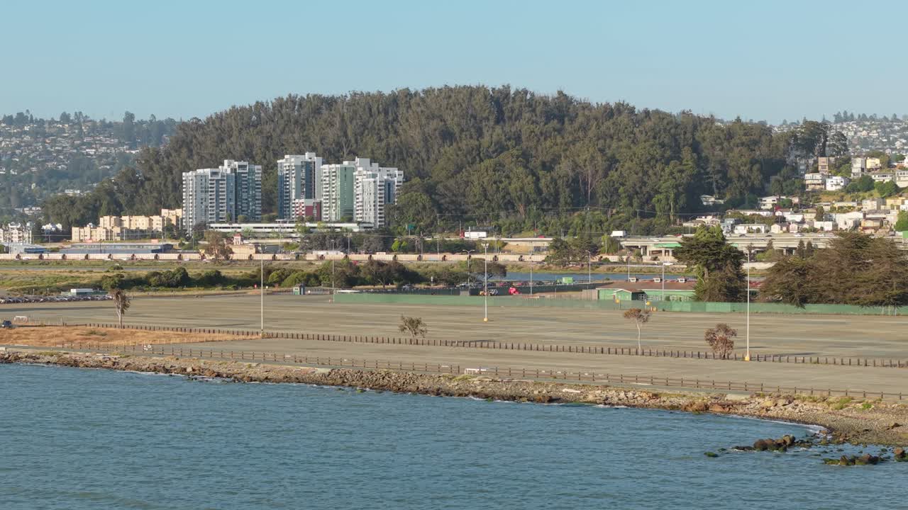 The edge of Albany blends city and coast, seen here in an expansive aerial view from the shoreline outward.
