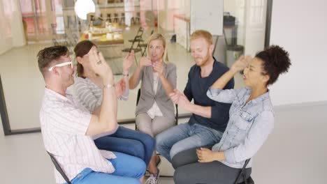 colleagues giving high five