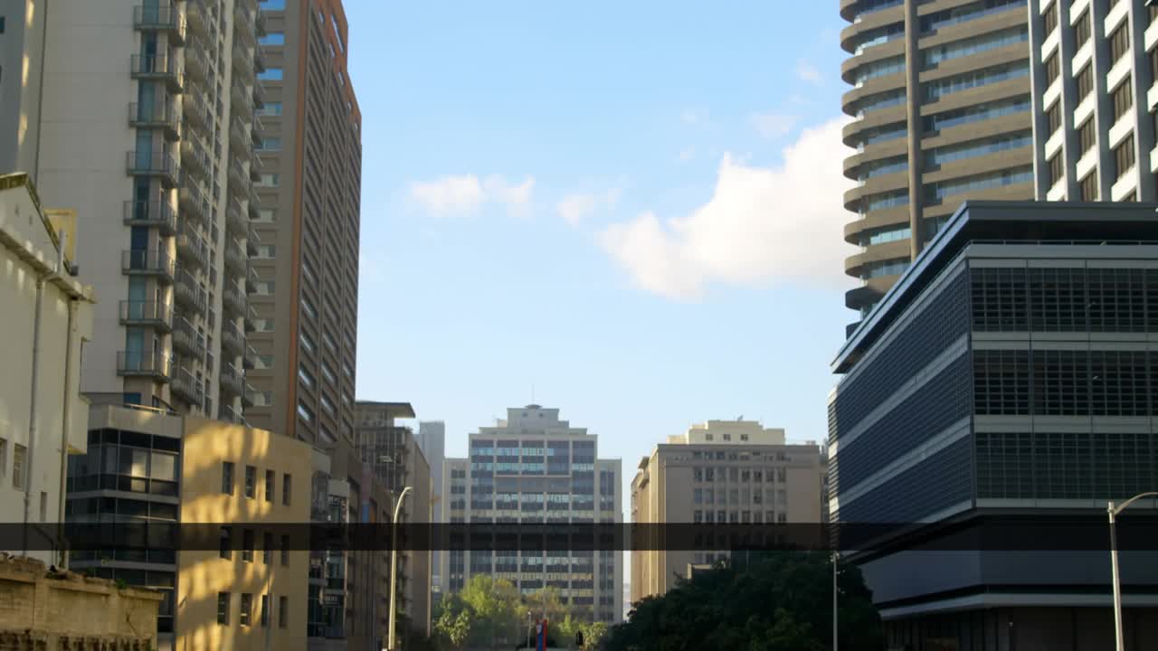 Diagnostic overlay rising over downtown, dark bar sliding then white code bar shifting for readout