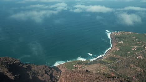 aerial view through clouds of beautiful ocean on the coast of spain