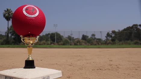 kickball trophy on a baseball field