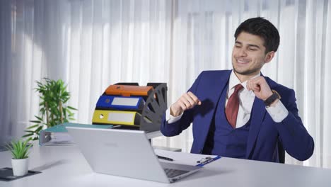 Delightful-and-happy-young-entrepreneur-man-dancing.